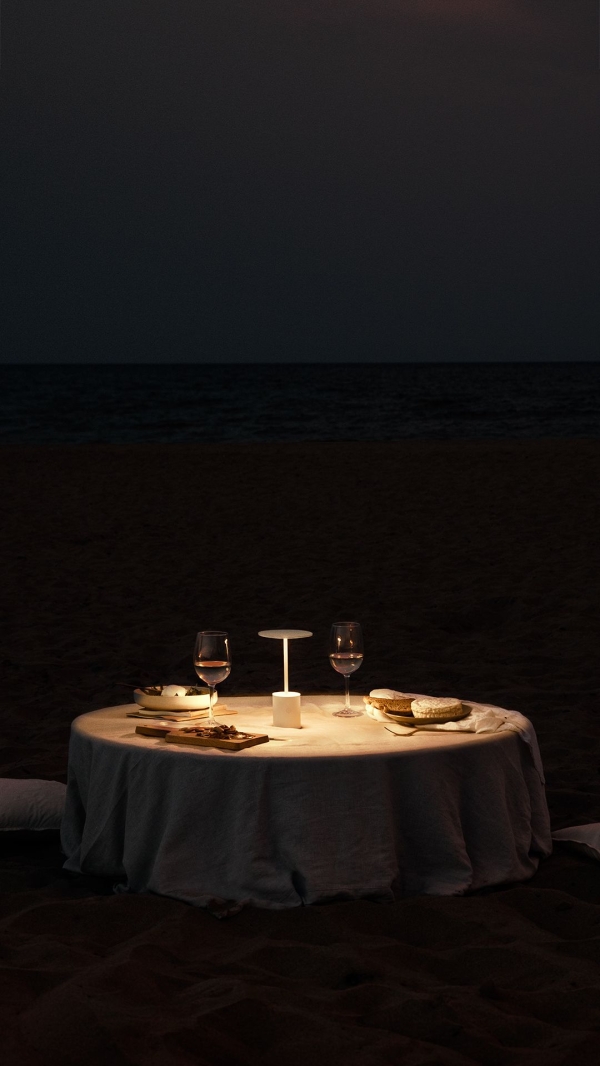 White table lamp that illuminates mealtimes.