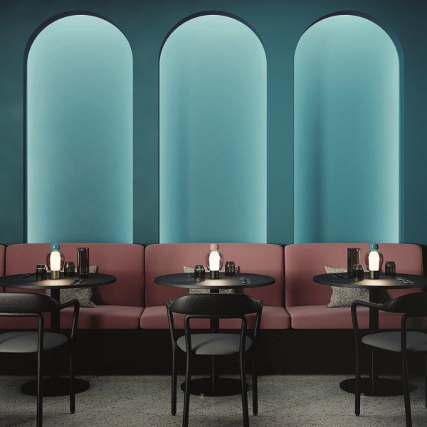 Colorful table lamp with a blown glass shade.