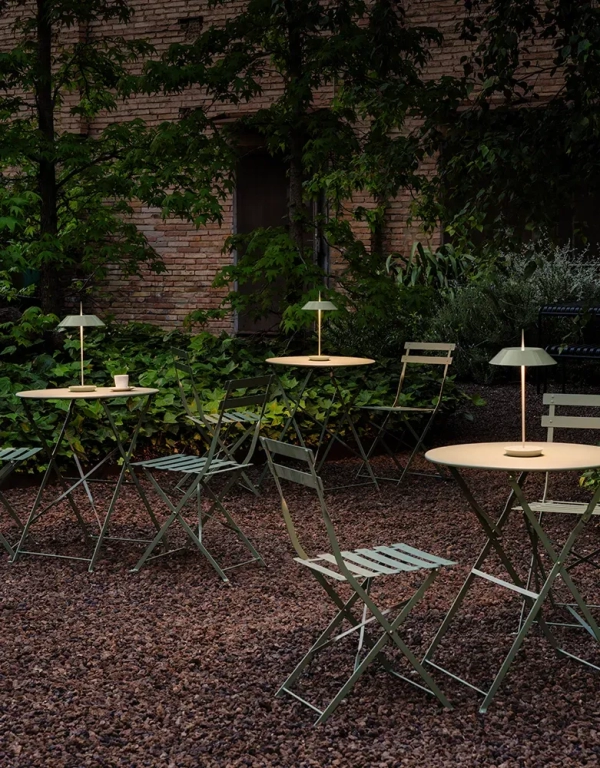 Sea green table lamp, placed on an outdoor table