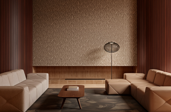 Elegant floor lamp with a black mesh spherical diffuser, set on a slender stand, casting a soft glow in a warm-toned living room with geometric lines.