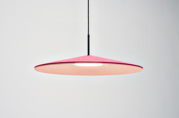 Pink disc-shaped acoustic pendant light viewed from the front, featuring a central integrated light source and a vertical black rod, against a light background.