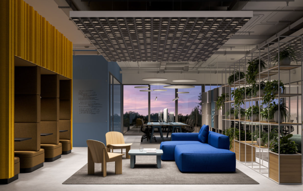 Acoustic ceiling module with integrated lighting above a modern meeting and workspace, complemented by round pendant lights in the background.