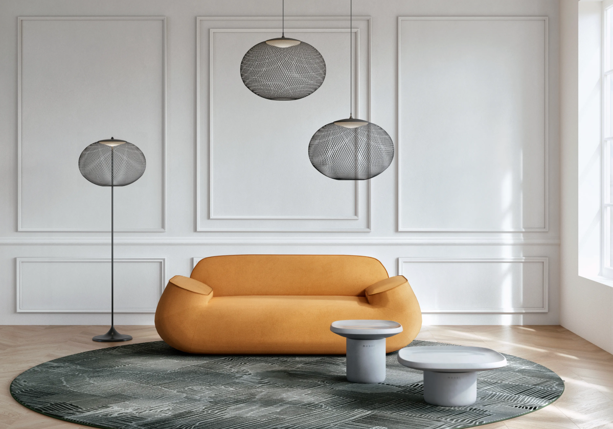 Trois luminaires design NR2 de Moooi, suspendus et sur pied, éclairent un séjour élégant
