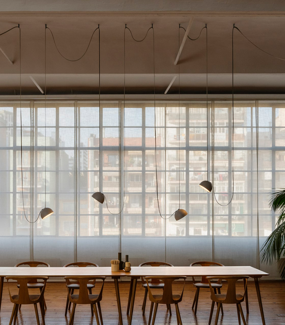 Plusminus by Vibia: Single conductive textile and cup-shaped luminaire.